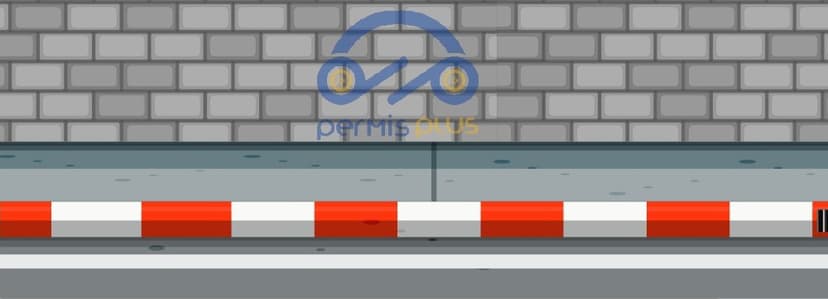 رصيف مصبوغ بالأحمر والأبيض مع وجود خط متصل بجانبه